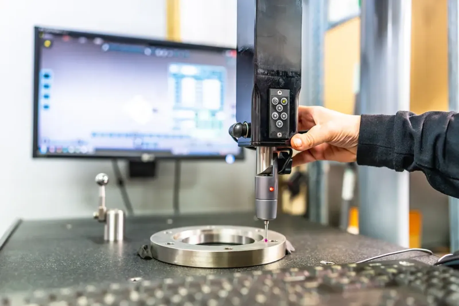 Technician working with three-dimensional verification equipment
